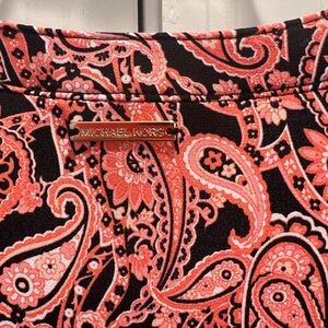 NWT. Michael KORS dress. Size 1X. Sleeveless v-neck ruffle at bottom.